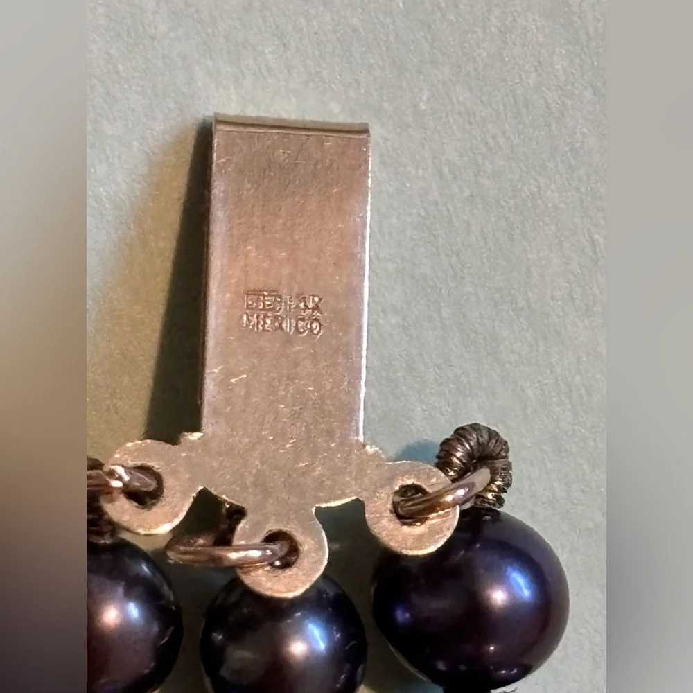 Tahitian black pearl bracelet with 14k gold filigree clasp.